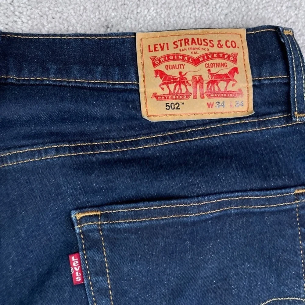 Levis Jeans Mens 34x34 Blue 502 Tapered Fit Dark Wash Stretch Denim Casual‎